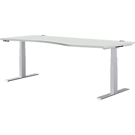 Schäfer Shop Genius Escritorio MODENA FLEX, regulable en altura eléctricamente, forma libre, fijación a la derecha, pie en T, ancho 1800 x alto 645-1290 mm, aluminio gris claro/blanco + panel de memoria