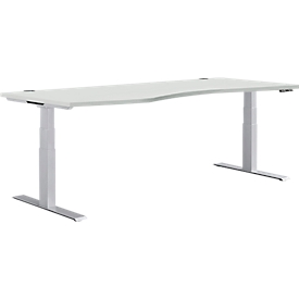 Schäfer Shop Genius Escritorio MODENA FLEX, regulable en altura eléctricamente, forma libre, fijación a la izquierda, pie en T, ancho 1800 x alto 645-1290 mm, aluminio gris claro/blanco + panel de memoria