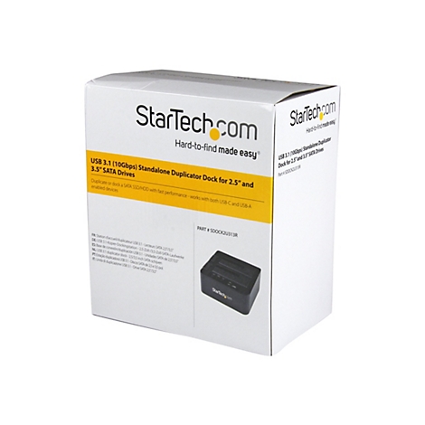 BoÃ®te blanche avec des accents jaunes. Il est Ã©crit StarTech.com, USB 3.1 Duplicator Dock pour disques SATA 2.5 et 3.5.