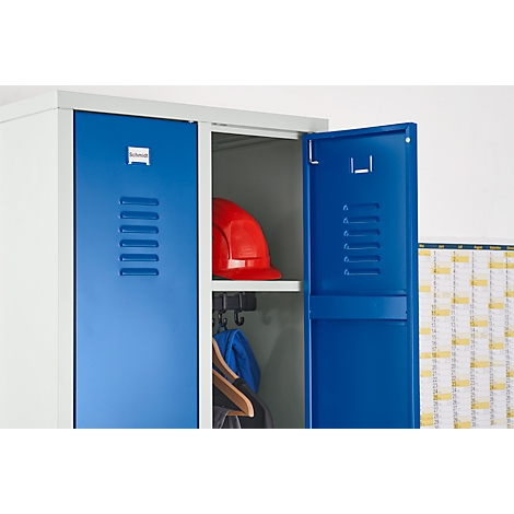 Blue locker with an open door. Inside a red helmet and clothing.