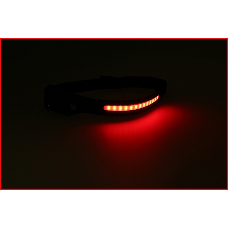 Schwarzes Armband mit roten LEDs, die leuchten. Im Dunkeln sichtbar.