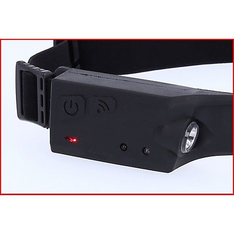 Schwarze Stirnlampe, die ein rotes Licht zeigt. Mit Ein/Aus-Taste, Funksymbol und weißem LED-Licht.