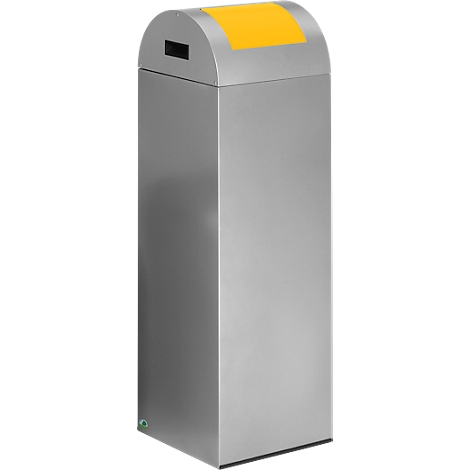 Grey, rectangular trash can with yellow top. There is a slot for inserting waste at the top.