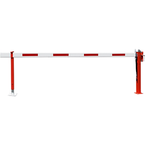 A red and white barrier blocks the way. The barrier has red stripes.