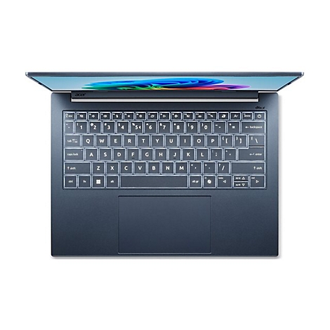 Draufsicht auf ein geöffnetes Acer-Laptop. Tastatur mit beleuchteten Tasten, Hintergrund mit bunten Farben.