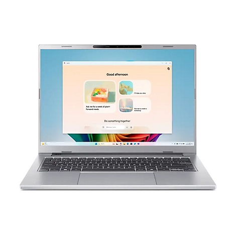 Ein silberner Laptop, der im geöffneten Zustand einen Bildschirm mit Optionen zeigt. Der Text im Bild lautet: "Good Afternoon, Ask me for a week of plant-forward meals, I'll help you relax, Ask me to create a workshop".