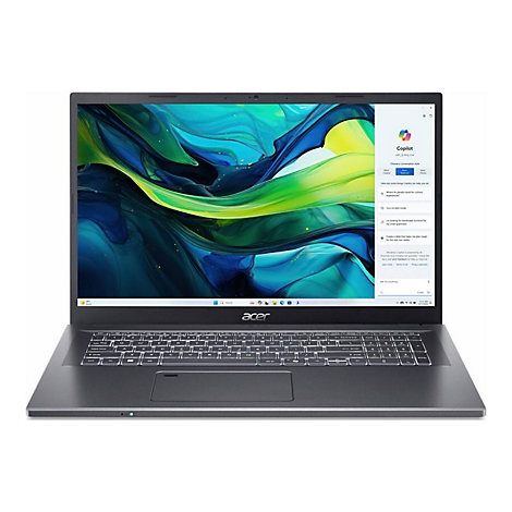 Dunkelgraues Acer Laptop, Tastatur, Bildschirm zeigt Copilot Oberfläche. Auf hellem Tisch stehend, schwarzer Rahmen.