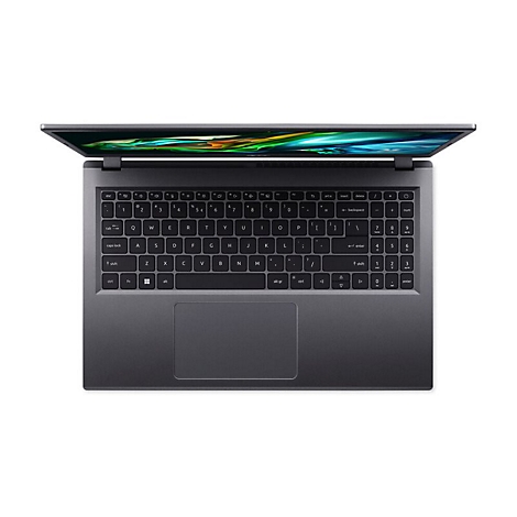 Draufsicht auf einen dunklen Laptop mit geöffnetem Bildschirm. Die Tastatur und das Touchpad sind deutlich zu erkennen.