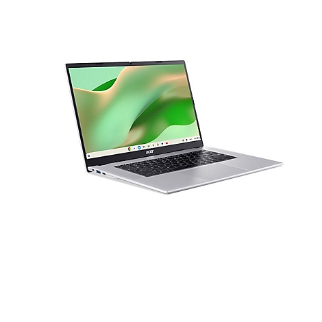 Silbernes Acer Chromebook in Perspektive vor weißem Hintergrund mit abstraktem, grünem Bildschirmhintergrund.