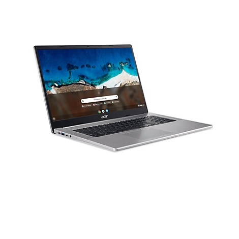 Silberfarbenes Acer Chromebook. Der Bildschirm zeigt eine Strandansicht und Google-Symbole.