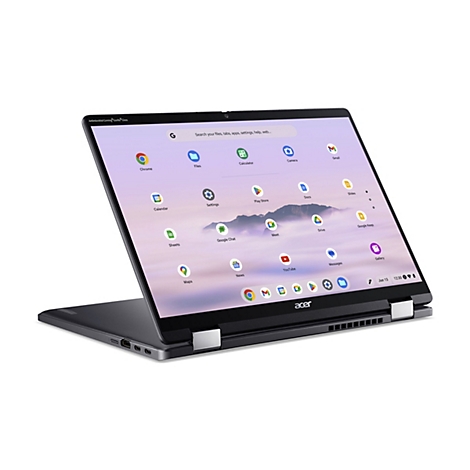 Ein grauer Laptop mit Touchscreen, der halb geöffnet ist. Auf dem Bildschirm sind App-Symbole und Suchleiste zu sehen. Rechts unten steht das Datum und die Uhrzeit.