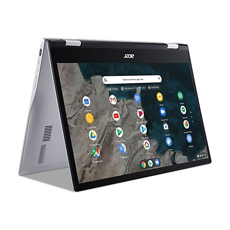 Ein silberner Acer Laptop ist teilweise geöffnet und zeigt das Display. Auf dem Bildschirm sind verschiedene App-Icons zu sehen, darunter Google Chrome, Gmail, Kalender und Google Maps.