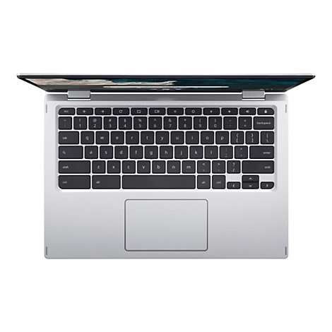 Draufsicht auf einen geöffneten, silbernen Laptop. Die Tastatur ist zu sehen, die Tasten sind schwarz mit weißer Schrift.