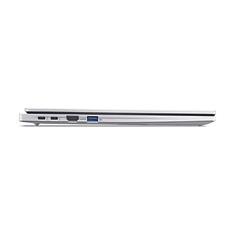 Seitenansicht eines silbernen Laptops, der flach auf einer weißen Oberfläche liegt. Sichtbar sind Anschlüsse für USB, HDMI und Strom.