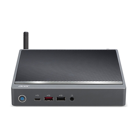 Ein grauer Acer-Mini-PC mit einer Antenne, einem Karbonmuster auf der Oberseite und verschiedenen Anschlüssen an der Vorderseite.
