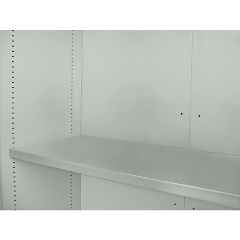 Interior view of a shelf with a light gray shelf installed in a white cabinet. Holes for height adjustment can be seen in the side walls.