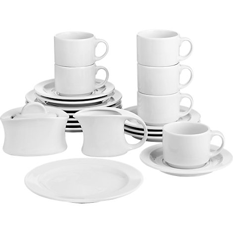 Various white dishes including cups, saucers, plates, sugar bowls and milk jugs.