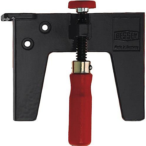 Zwarte gereedschapsklem met rode handgreep en rode knop. Opdruk: Bessey.
