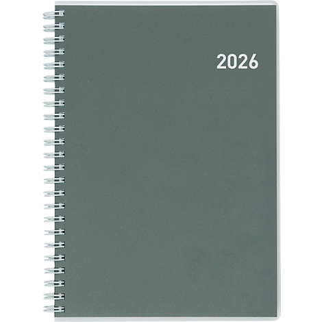 Agenda à spirale grise avec l'année blanche 2026. L'agenda est photographié sur fond blanc.