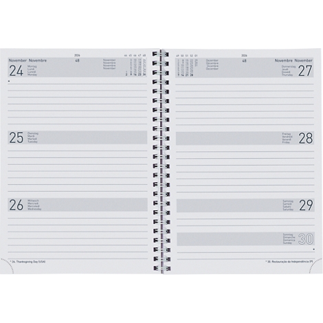 Un cahier ouvert avec une reliure spirale montre des pages avec des lignes et des dates.