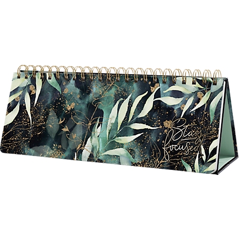 Calendrier de bureau avec un motif floral et la citation 'Stay Focused'.