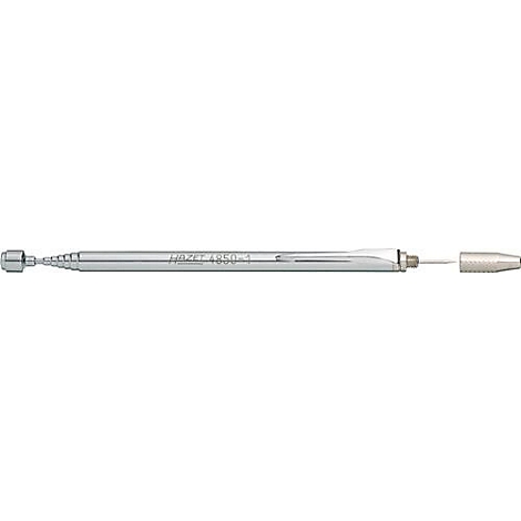 Turbine dentaire avec une surface argentée. Texte lisible.