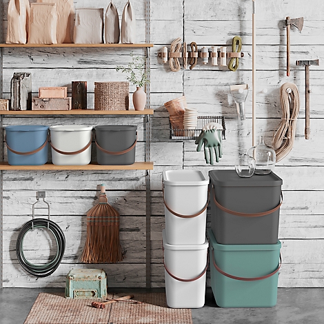 Shelf wall with buckets, broom, gardening tools, bags and boxes. Wood look. Colors: blue, white, gray, green.