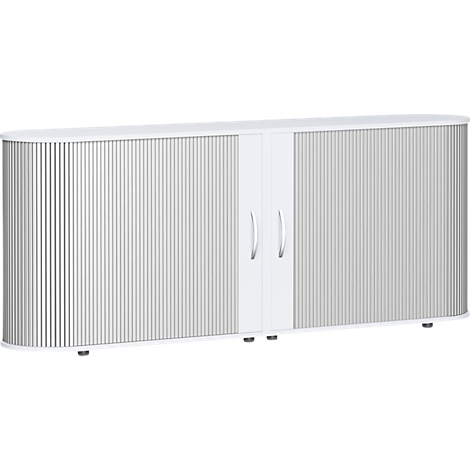 White cabinet with ribbed doors and two handles. Base with rollers. Rounded corners.