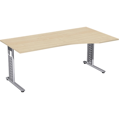 Light wood desk with silver metal legs. The tabletop has a curved edge.