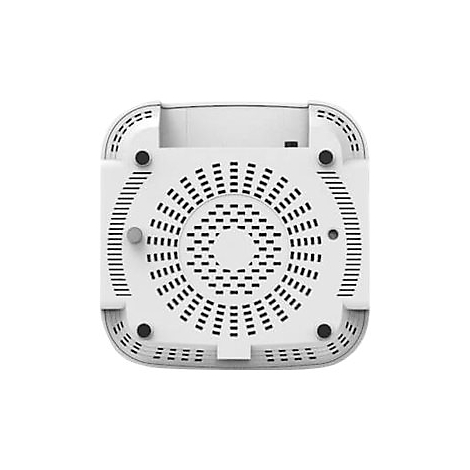 Draufsicht auf ein weißes elektronisches Gerät. Runde Belüftungsöffnungen umgeben einen mittigen, größeren Kreis, kleine Füße an den Ecken.