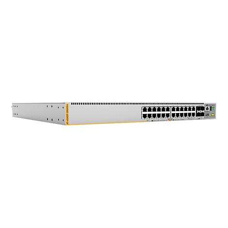 Allied Telesis Netzwerk-Switch in grauem Metallgehäuse mit zahlreichen Ports vor weißem Hintergrund.