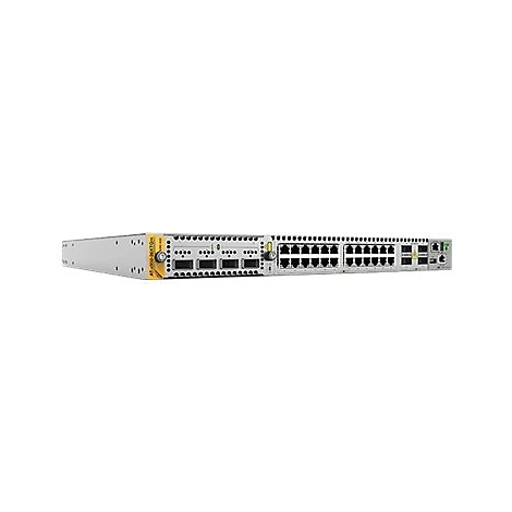 Ein grauer Netzwerk-Switch mit gelbem Branding auf der linken Seite, vielen Anschlüssen und LED-Anzeigen.