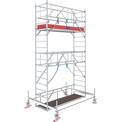 Ein freistehendes, rollbares Gerüst aus Metall. Es hat mehrere Ebenen, rote Plattformen, blaue Sicherungen und Räder.