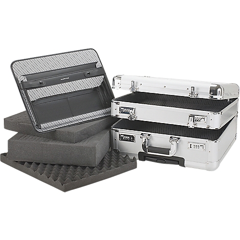 Silver briefcases, open and side by side. Foam inserts for secure storage.