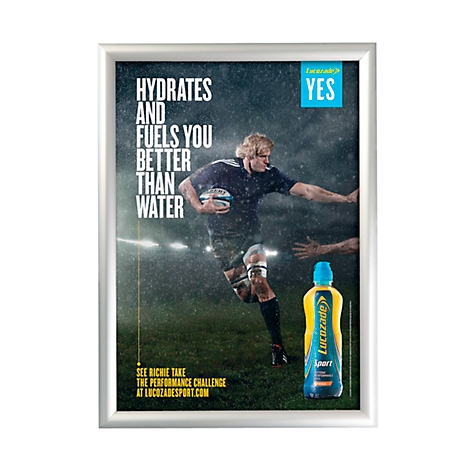 Advertising poster. A rugby player running in the rain with a Lucozade drink next to him.