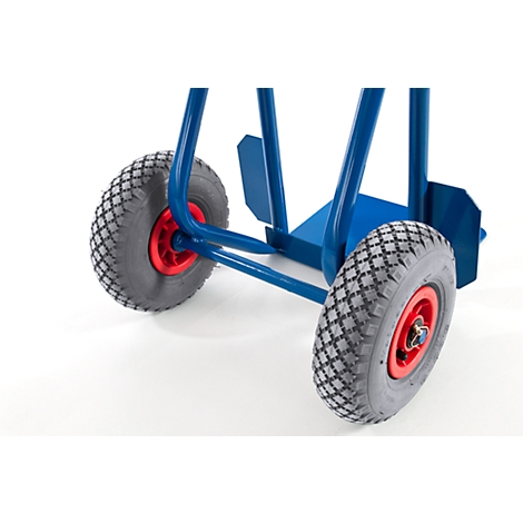 Close-up of a blue hand truck with gray tires and red rims.
