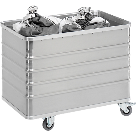Grey metal laundry tub on wheels, filled with laundry.