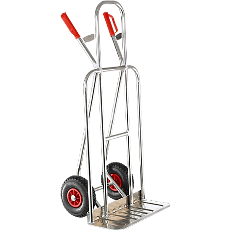 A silver hand truck with red handles and red wheel hubs. The image shows a close-up view of the hand truck.