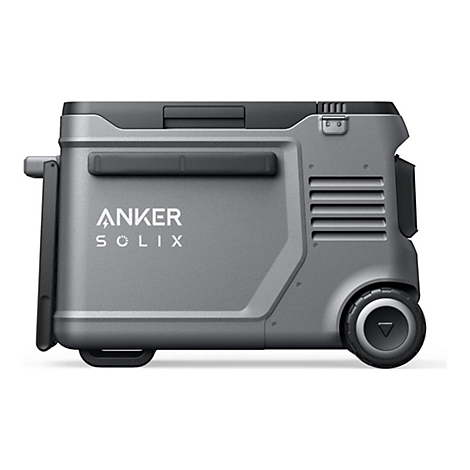 Graue Anker Solix Kühlbox mit schwarzem Griff und Rädern vor neutralem Hintergrund.