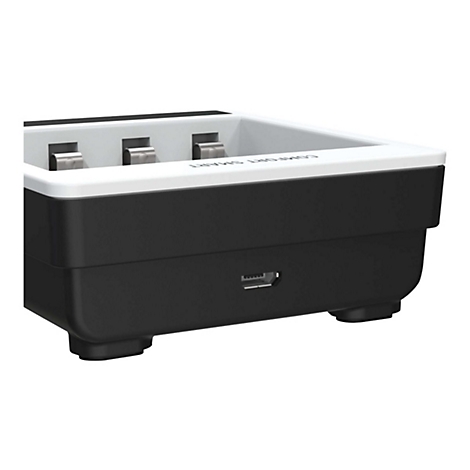 Schwarze Ladestation mit weißem Rand und drei Metallkontakten, vorne mit Micro-USB-Anschluss.