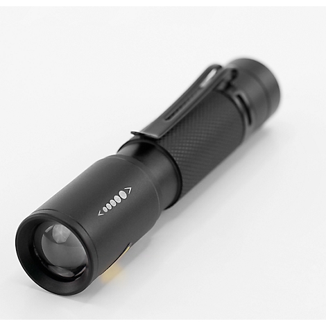 Black LED flashlight with textured surface, clip, and brightness symbols. It rests diagonally on a white background.