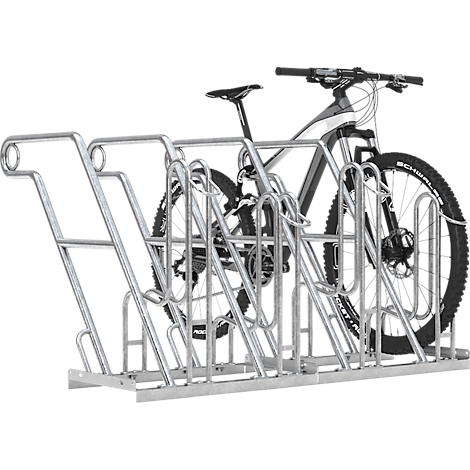 Portabicicletas metálico con una bicicleta de montaña. Ambos son plateados. El portabicicletas es adecuado para varias bicicletas.