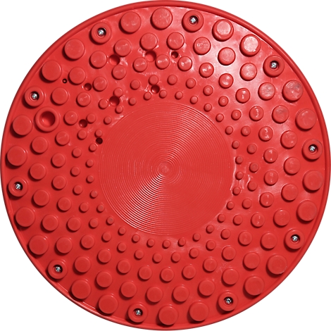 Disco giratorio rojo con tachuelas y bolas metálicas. En el centro, un patrón en relieve.