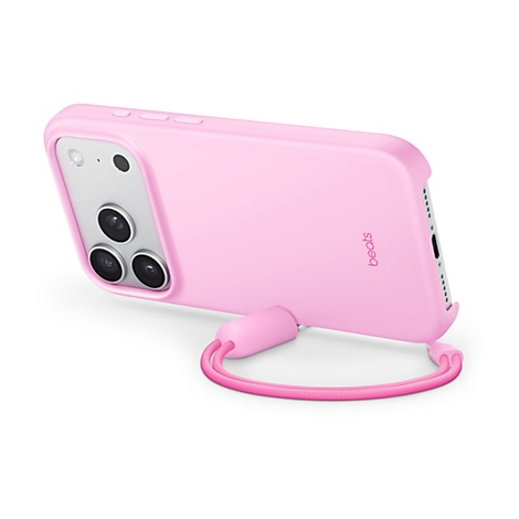 Un iPhone rose avec un étui de protection et une dragonne assortis. La marque "beats" est visible sur le côté de l'étui.