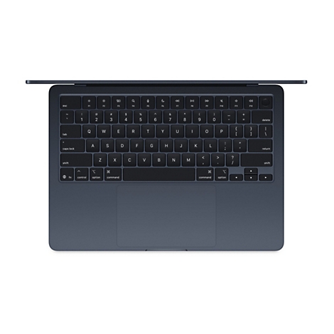 Draufsicht auf ein flaches, dunkles Laptop-Keyboard. Tasten mit Beschriftungen, darunter Buchstaben, Zahlen und Sonderzeichen.