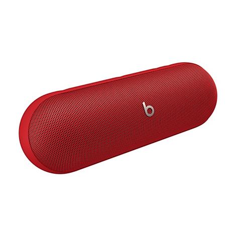 Enceinte Beats Pill rouge avec grille en maille. Le logo Beats argenté est visible sur la surface.