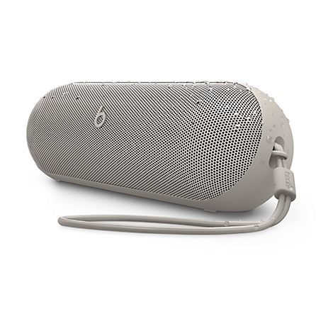 Beige, zylindrischer Bluetooth-Lautsprecher mit Wassertropfen auf der Oberfläche und Trageschlaufe.