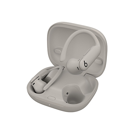 Beiges Beats In-Ear-Headset mit Ladecase vor weißem Hintergrund.
