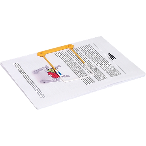 A yellow reading aid lies on a sheet of paper with text, a pop-up picture is visible.