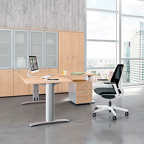 Office with wooden desk, black office chair, cabinets and window with city view.